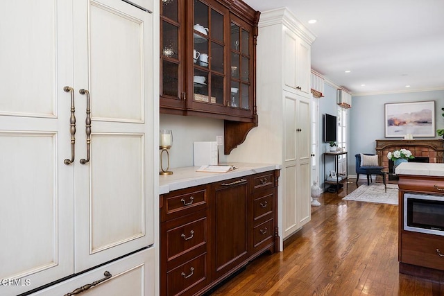 741 Burleigh Dr, Pasadena, CA 91105 - bar with stainless steel microwave, dark wood-style floors, and crown molding