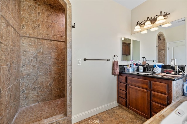 38792 Comanche Point Rd, Arvin, CA 93203 - bathroom with walk in shower, baseboards, and vanity