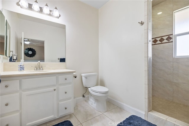 38792 Comanche Point Rd, Arvin, CA 93203 - full bathroom featuring toilet, tile patterned floors, tiled shower, baseboards, and vanity