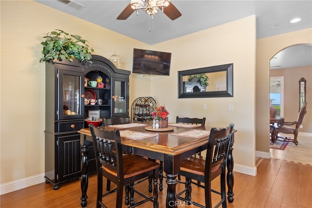 38792 Comanche Point Rd, Arvin, CA 93203 - dining room featuring arched walkways, ceiling fan, light wood finished floors, baseboards, and recessed lighting