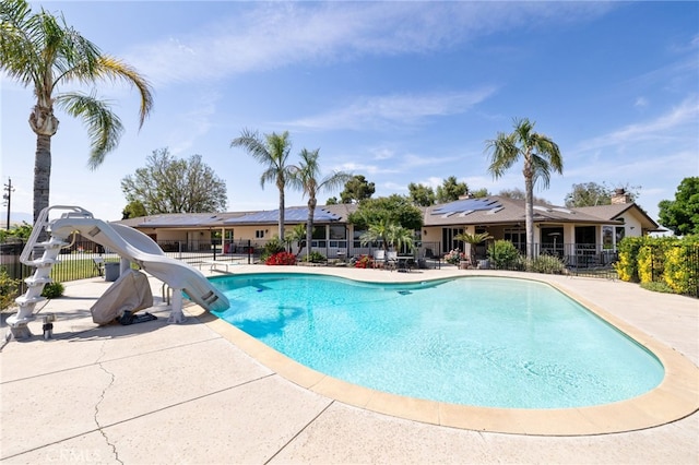 38792 Comanche Point Rd, Arvin, CA 93203 - view of pool with a water slide, fence, and a patio area