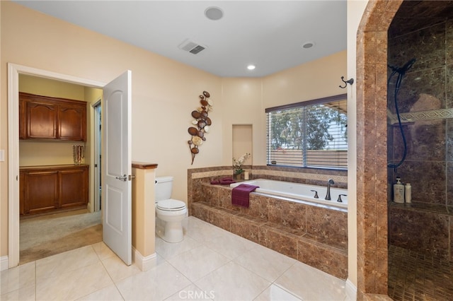 38792 Comanche Point Rd, Arvin, CA 93203 - bathroom with tile patterned floors, a garden tub, tiled shower, and toilet