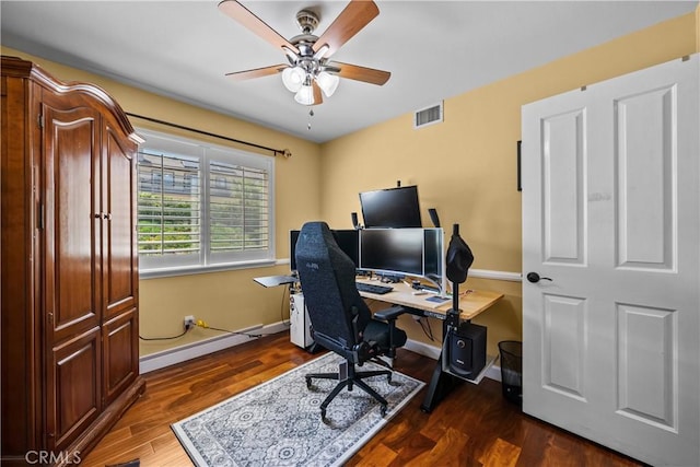 28456 Calex Dr, Valencia, CA 91354 - home office with a ceiling fan, baseboards, a baseboard heating unit, and dark wood-style floors