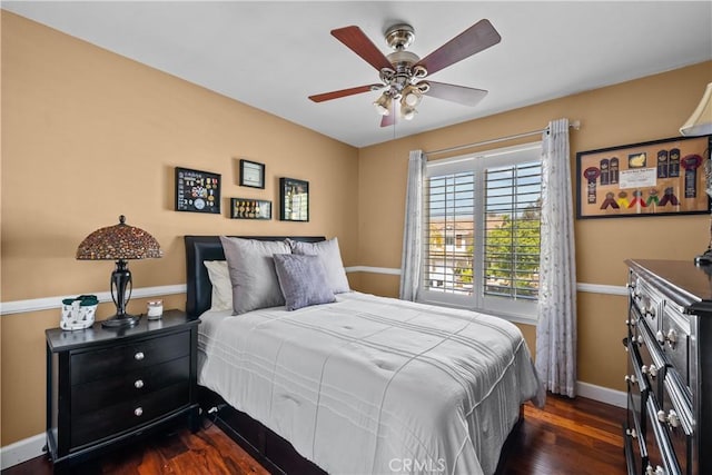 28456 Calex Dr, Valencia, CA 91354 - bedroom with dark wood finished floors, baseboards, and a ceiling fan
