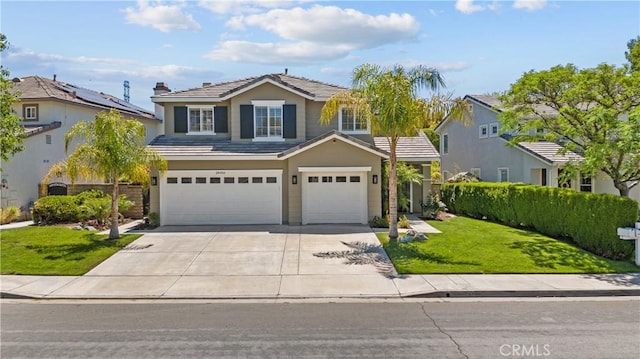 28456 Calex Dr, Valencia, CA 91354 - traditional-style home with an attached garage, concrete driveway, stucco siding, a front yard, and a tile roof