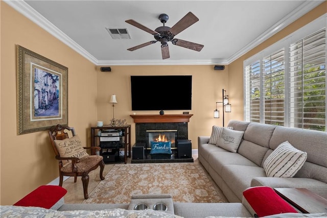 28456 Calex Dr, Valencia, CA 91354 - living area featuring ornamental molding, ceiling fan, and a fireplace
