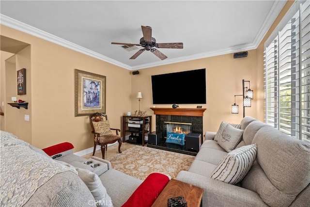 28456 Calex Dr, Valencia, CA 91354 - living room featuring a ceiling fan, crown molding, baseboards, and a premium fireplace