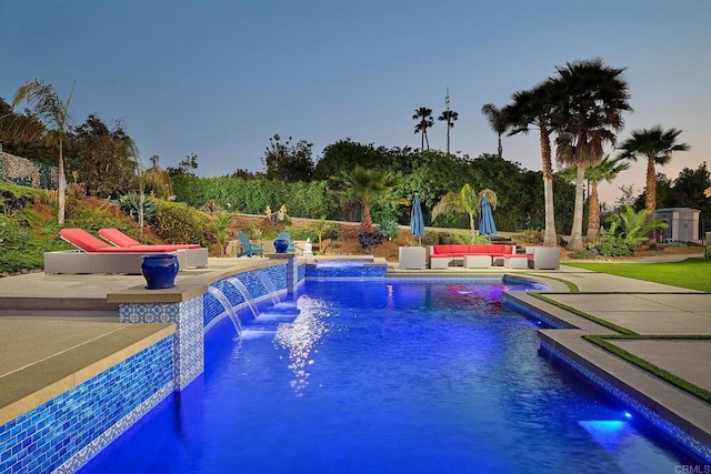 outdoor pool featuring a patio area and outdoor lounge area