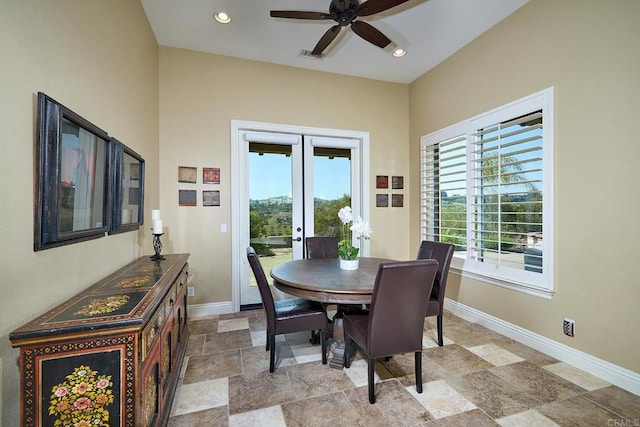 dining area with baseboards, french doors, a ceiling fan, light stone finish floors, and recessed lighting