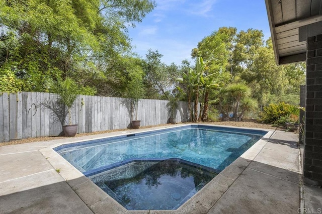 2348 Watson Way, Vista, CA 92081 - view of swimming pool with a pool with connected hot tub, a patio, and a fenced backyard