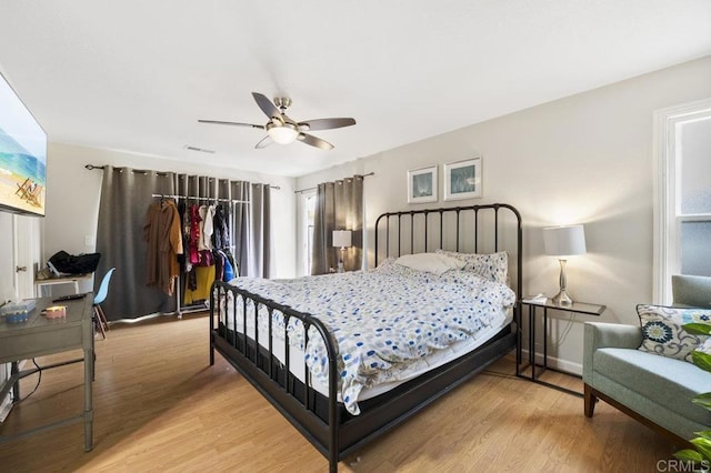 2348 Watson Way, Vista, CA 92081 - bedroom featuring light wood-type flooring, baseboards, a ceiling fan, and a closet