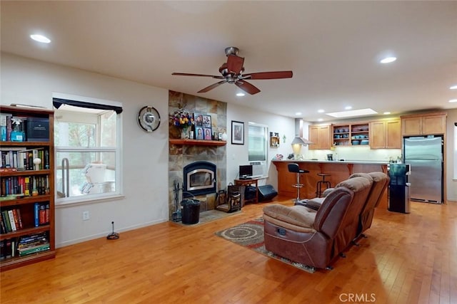 10647 Forbestown Rd, Challenge, CA 95925 - living area with light wood-type flooring, recessed lighting, ceiling fan, baseboards, and a fireplace