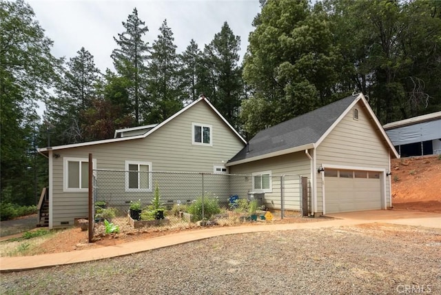 10647 Forbestown Rd, Challenge, CA 95925 - view of front facade with a garage, driveway, crawl space, and view of scattered trees