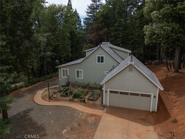 10647 Forbestown Rd, Challenge, CA 95925 - view of front facade with concrete driveway and an attached garage