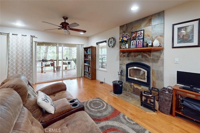 10647 Forbestown Rd, Challenge, CA 95925 - living area with wood finished floors, ceiling fan, a fireplace, and recessed lighting