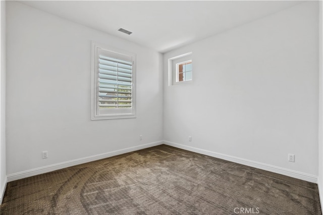 28 Dogwood, Lake Forest, CA 92630 - unfurnished room featuring dark carpet and baseboards
