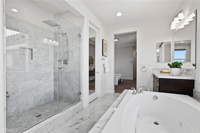 28 Dogwood, Lake Forest, CA 92630 - bathroom featuring a tub with jets, a marble finish shower, connected bathroom, vanity, and recessed lighting