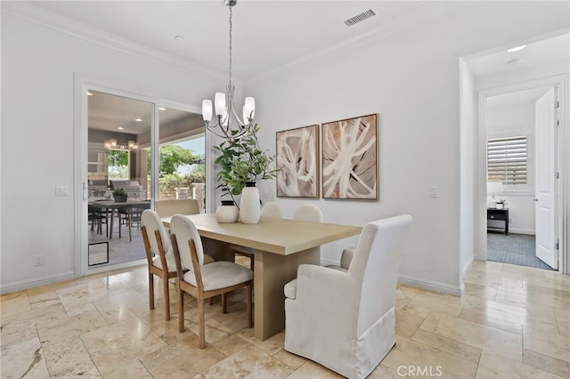 28 Dogwood, Lake Forest, CA 92630 - dining space with a chandelier, ornamental molding, baseboards, and stone tile floors