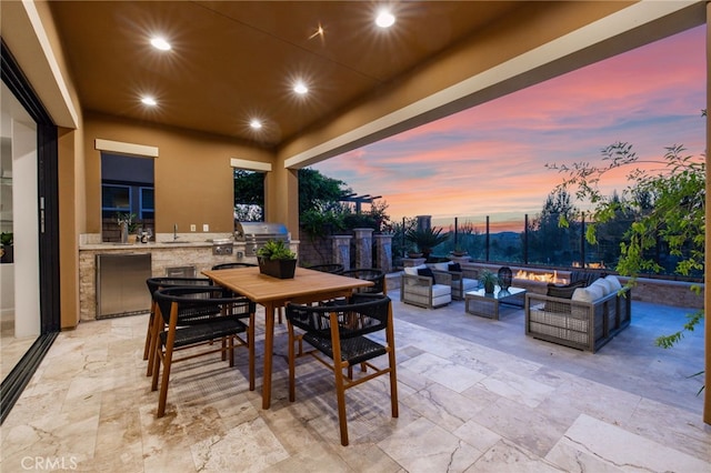 28 Dogwood, Lake Forest, CA 92630 - view of patio featuring an outdoor living space with a fire pit, area for grilling, outdoor dining area, and a sink
