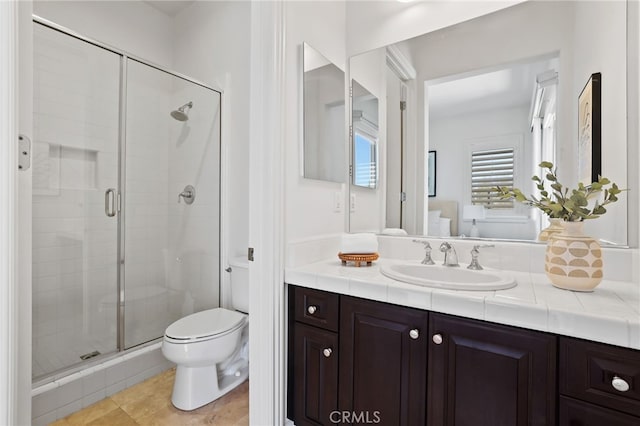 28 Dogwood, Lake Forest, CA 92630 - full bath featuring toilet, a stall shower, vanity, and tile patterned flooring
