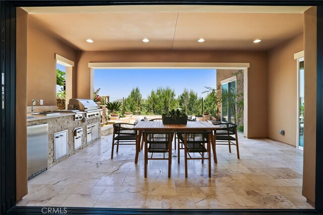 28 Dogwood, Lake Forest, CA 92630 - dining room featuring stone tile flooring and recessed lighting