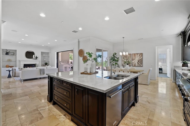 28 Dogwood, Lake Forest, CA 92630 - kitchen featuring a sink, a chandelier, recessed lighting, stainless steel dishwasher, and a kitchen island with sink