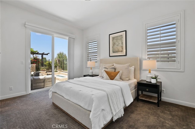 28 Dogwood, Lake Forest, CA 92630 - bedroom featuring access to exterior, dark colored carpet, and baseboards