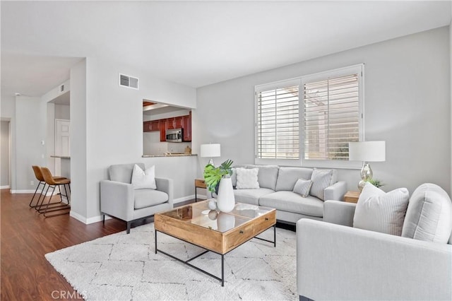 823 N Kintyre Dr, Orange, CA 92869 - living area featuring dark wood finished floors and baseboards