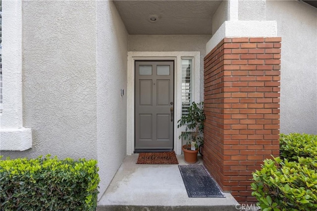 823 N Kintyre Dr, Orange, CA 92869 - entrance to property featuring stucco siding and brick siding