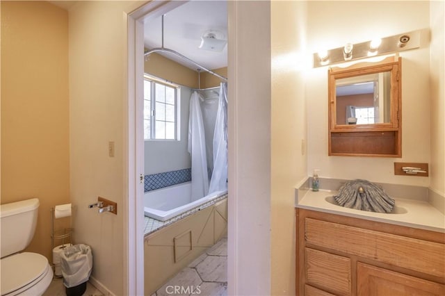 863 Ford Ln, Big Bear Lake, CA 92315 - bathroom with tiled shower / bath combo, toilet, and vanity