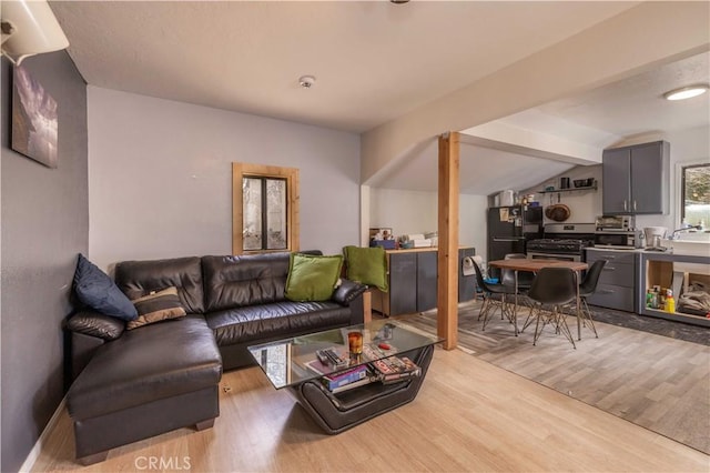 863 Ford Ln, Big Bear Lake, CA 92315 - living area with light wood finished floors and vaulted ceiling