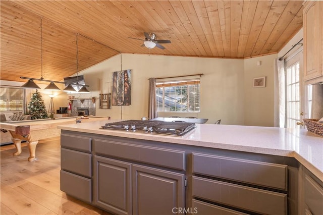 863 Ford Ln, Big Bear Lake, CA 92315 - kitchen featuring wooden ceiling, stainless steel gas cooktop, gray cabinetry, open floor plan, and vaulted ceiling