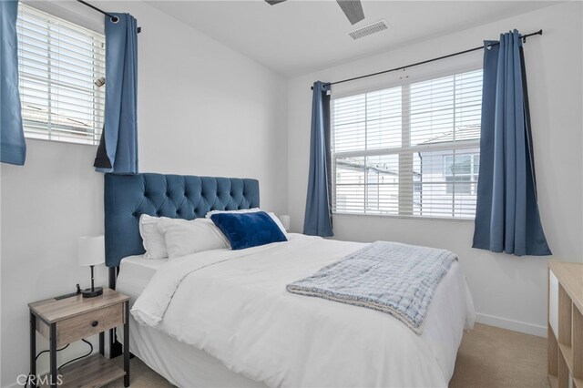 4565 S Bryant Paseo Ln, Ontario, CA 91762 - bedroom with carpet flooring, baseboards, and ceiling fan