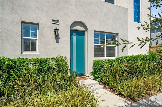 4565 S Bryant Paseo Ln, Ontario, CA 91762 - view of exterior entry with stucco siding