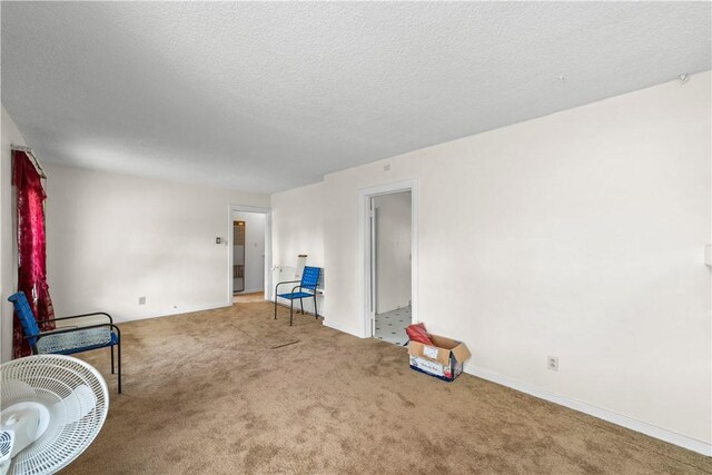 527 W Olive Ave, Monrovia, CA 91016 - unfurnished room featuring carpet flooring, baseboards, and a textured ceiling