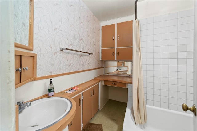 527 W Olive Ave, Monrovia, CA 91016 - bathroom featuring wallpapered walls, a sink, and shower / bath combination with curtain