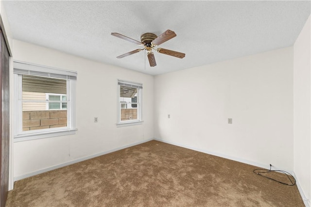 527 W Olive Ave, Monrovia, CA 91016 - carpeted empty room featuring baseboards and ceiling fan