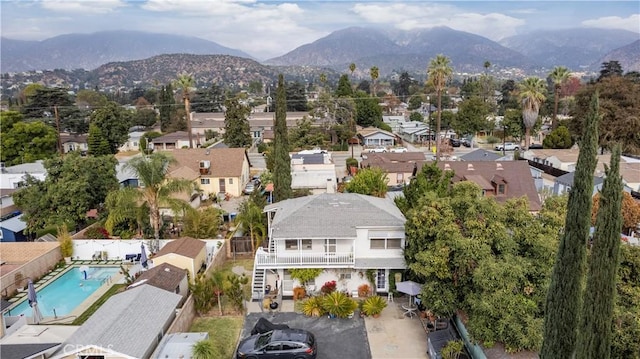 527 W Olive Ave, Monrovia, CA 91016 - aerial view of residential area with mountains and a pool