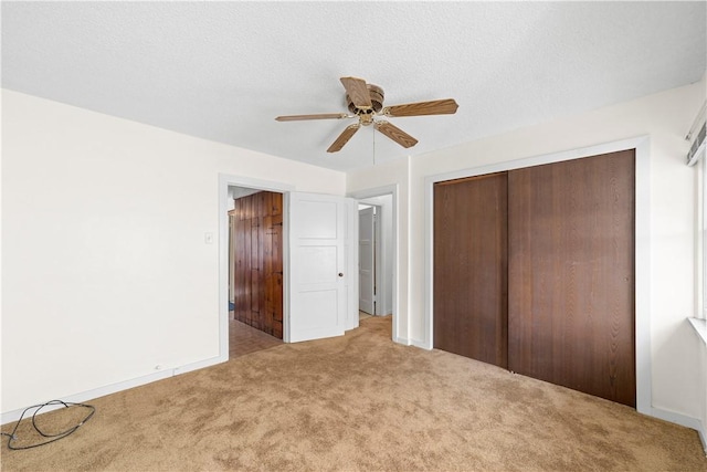 527 W Olive Ave, Monrovia, CA 91016 - unfurnished bedroom featuring carpet, a closet, and a ceiling fan