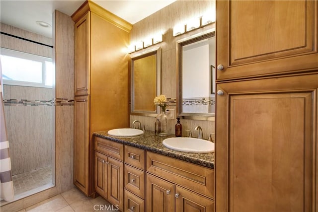 1100 Rutland Rd Unit 12, Newport Beach, CA 92660 - bathroom featuring a tile shower, double vanity, and tile patterned flooring