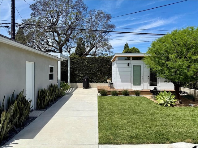 3231 Marber Ave, Long Beach, CA 90808 - view of green lawn featuring an outbuilding