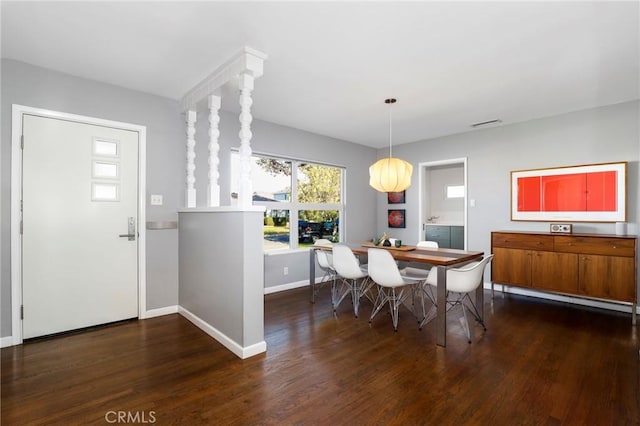 3231 Marber Ave, Long Beach, CA 90808 - dining space with dark wood-style flooring and baseboards