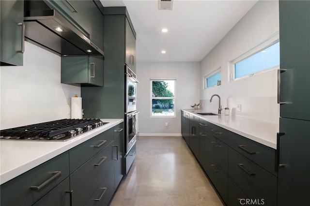 3231 Marber Ave, Long Beach, CA 90808 - kitchen with appliances with stainless steel finishes, a sink, finished concrete flooring, light countertops, and recessed lighting