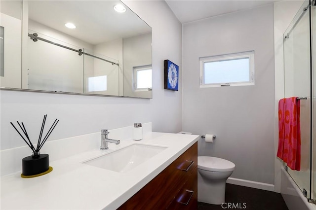 3231 Marber Ave, Long Beach, CA 90808 - full bathroom featuring toilet, vanity, recessed lighting, and combined bath / shower with glass door