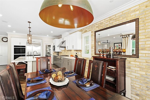 2521 Chad Zeller, Corona, CA 92882 - dining space with ceiling fan, crown molding, and recessed lighting