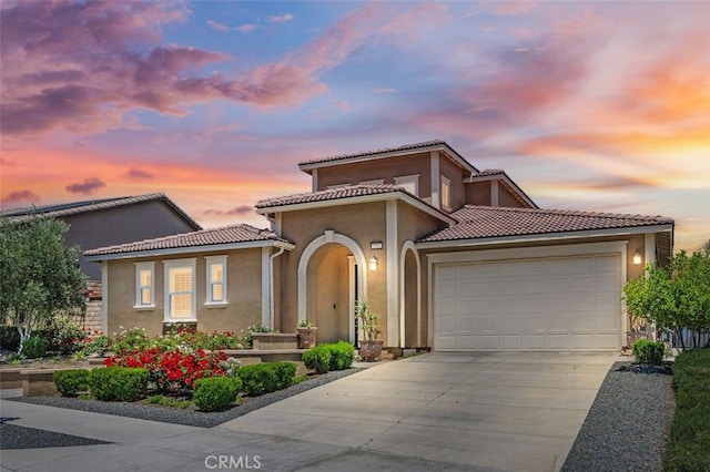 2521 Chad Zeller, Corona, CA 92882 - mediterranean / spanish home with driveway, a garage, stucco siding, and a tiled roof