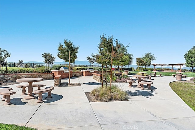 2521 Chad Zeller, Corona, CA 92882 - view of property's community with a pergola, a patio area, and fence
