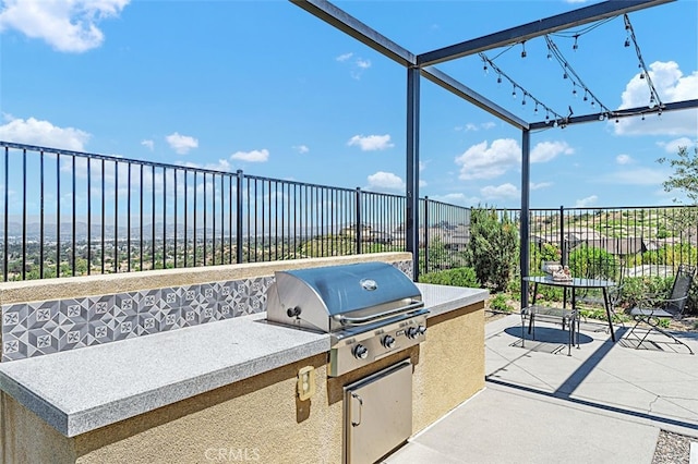 2521 Chad Zeller, Corona, CA 92882 - view of patio / terrace with area for grilling, fence, and exterior kitchen