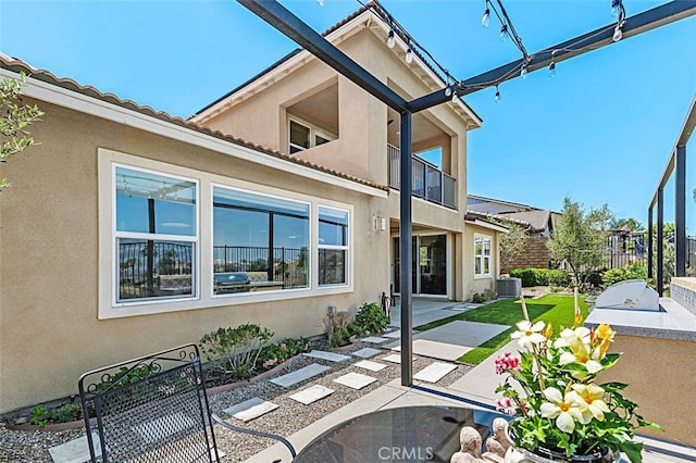 2521 Chad Zeller, Corona, CA 92882 - view of front of property with stucco siding, central AC unit, fence, and a tile roof