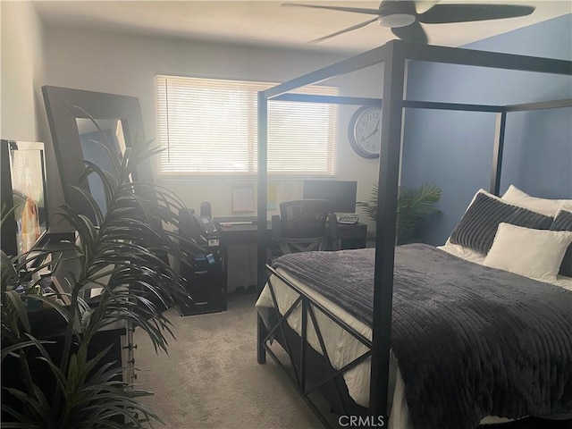 bedroom featuring carpet and a ceiling fan